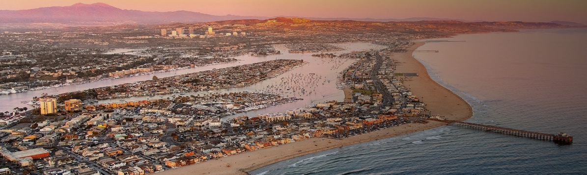 Aerial view of a jetty where the ocean meets the beach